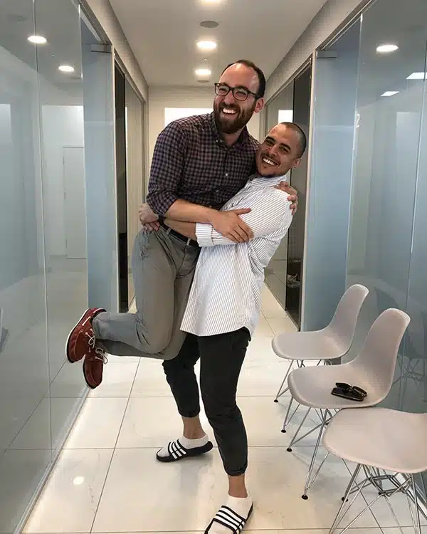 Karim-Abdel-Khalik carrying michael Willow Chiropractic