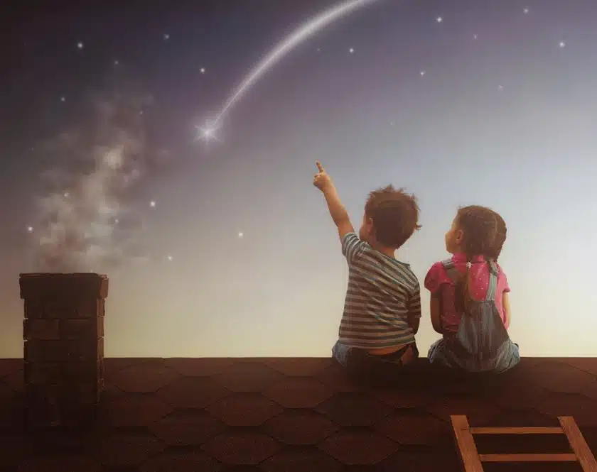 children sitting on roof watching the stars Willow Chiropractic