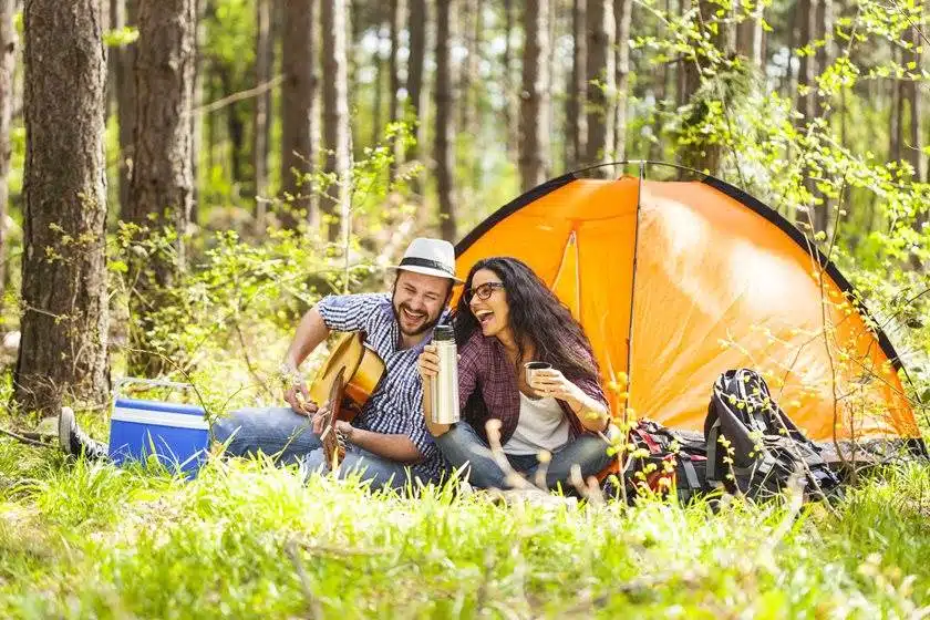 Couple outside Camping with tent Willow Chiropractic