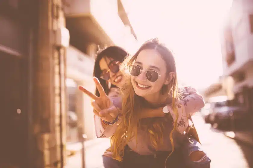 2 girls posing with sunglasses on Willow Chiropractic